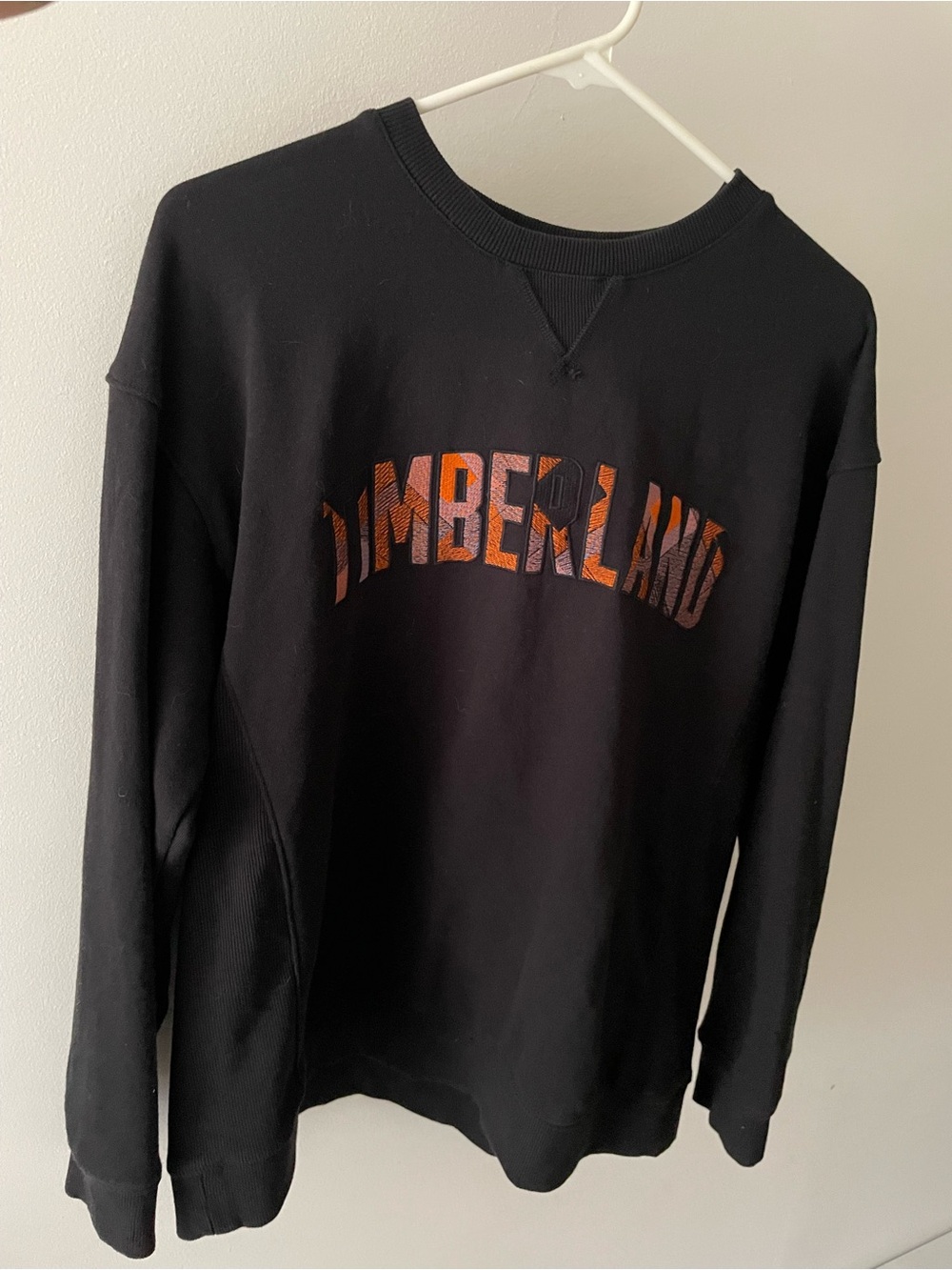 Timberland women’s medium Black Pullover Sweatshirt with Orange Logo